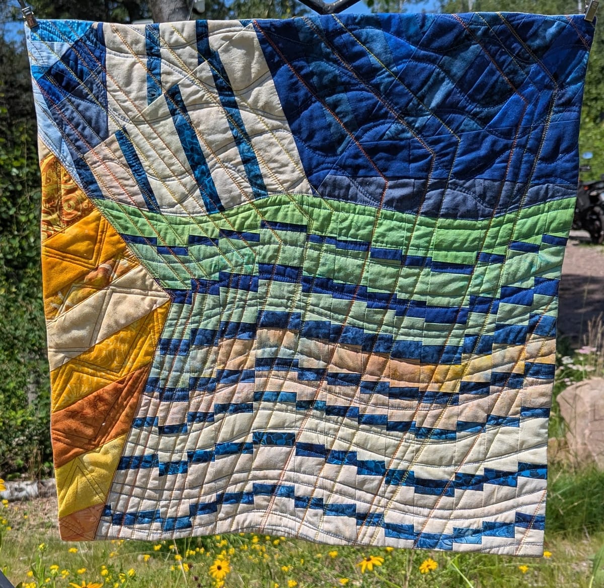 Small strip quilt